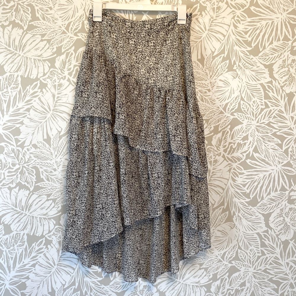 High to low skirt, black and white floral like pattern.